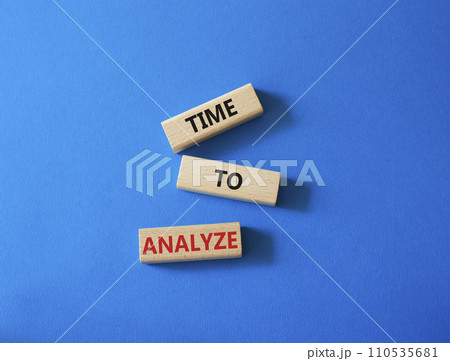 Time to Analyze symbol. Concept word Time to Analyze on wooden blocks. Beautiful blue background. Business and Time to Analyze concept. Copy space Time to Analyze symbol. Concept word Time to Analyze on wooden blocks. Beautiful blue background. Business and Time to Analyze concept. Copy space 110535681