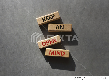 Keep an open mind symbol. Wooden blocks with words Keep an open mind. Beautiful grey background. Business and Keep an open mind concept. Copy space. 110535754