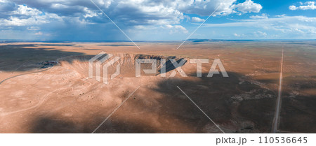 Aerial view of the Meteor Crater Natural Landmark at Arizona. Crater from a meteorite, from space. Elements of this image furnished by NASA. High quality photo 110536645