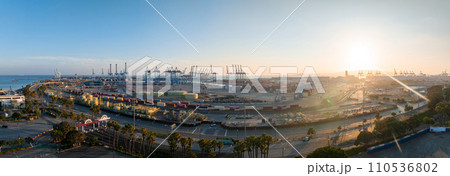 Thousands of shipping containers in the port of Long Beach near Los Angeles California. The Port of Long Beach in southern California during sunset. 110536802