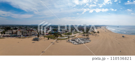 Skate board park in Venice beach with people skating by the Pacific ocean. Best and most popular skate park in the world. Skate board park in Venice beach with people skating by the Pacific ocean. Best and most popular skate park in the world. 110536821