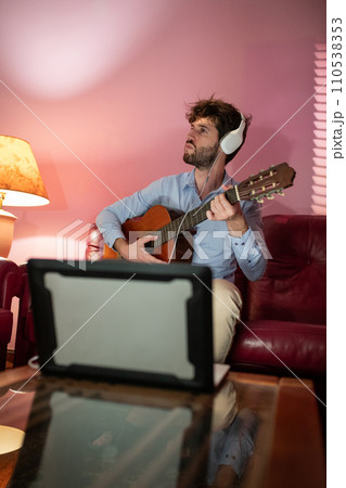 Boy Learning Music Guitar Lesson By Computer Streaming Call 110538353