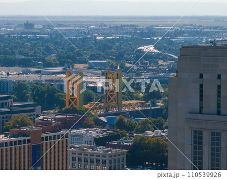 The Tower Bridge in Sacramento, California with the city of of Sacramento in the background and blue sky The Tower Bridge in Sacramento, California with the city of of Sacramento in the background and blue sky 110539926