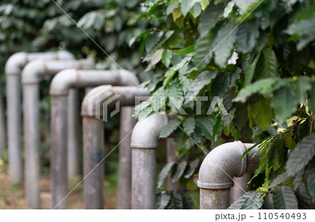Iron pipes are on green nature.Selective focus. 110540493