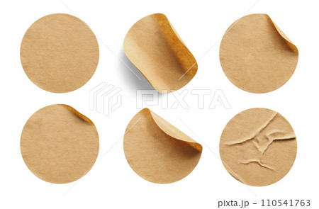 Brown round paper sticker label isolated on white background 110541763
