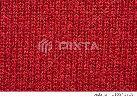 Red knitted wool texture background 110541819