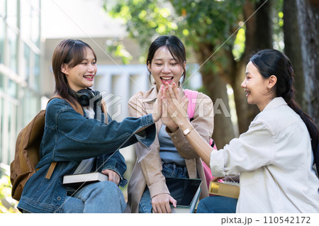 Group of Asian college student happy and celebrate after exam success Group of Asian college student happy and celebrate after exam success 110542172