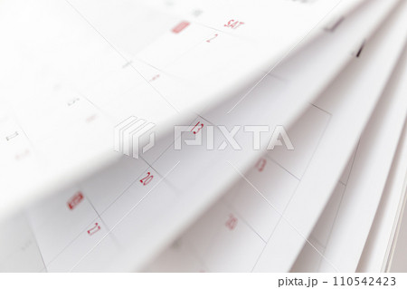 Calendar page flipping sheet close up blur background business schedule planning appointment meeting concept 110542423
