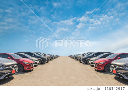 Lot of used car for sales in stock with sky and clouds Lot of used car for sales in stock with sky and clouds 110542917