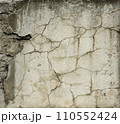 Old damaged cement block with cracks. For the apocalyptic design of old ruined architecture. Tile texture for your design. Cragged grimy retro cranny frayed run track. Crannied dirtied shabby smashed  110552424