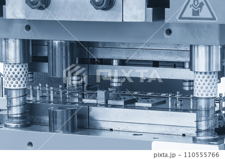The metalworking process by progressive die in the light blue scene. 110555766