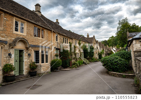 Picturesque Village Castle Combe In The Cotswolds Area In Wiltshire In England, United Kingdom Picturesque Village Castle Combe In The Cotswolds Area In Wiltshire In England, United Kingdom 110555823