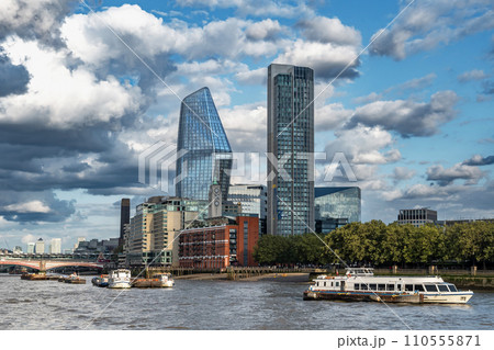 Modern Office Buildings, Skyscrapers (One Blackfriars, Southbank Tower) And Luxury Apartment Buildings Beneath The River Thames In London, United Kingdom Modern Office Buildings, Skyscrapers (One Blackfriars, Southbank Tower) And Luxury Apartment Buildings Beneath The River Thames In London, United Kingdom 110555871