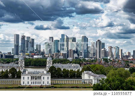 Skyline With Modern Business Buildings And Royal Naval College From The Greenwich Observatory Hill In London, United Kingdom Skyline With Modern Business Buildings And Royal Naval College From The Greenwich Observatory Hill In London, United Kingdom 110555877