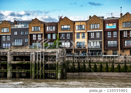 Narrow Houses And Apartments At The Embankment Of River Thames In London, United Kingdom Narrow Houses And Apartments At The Embankment Of River Thames In London, United Kingdom 110555901