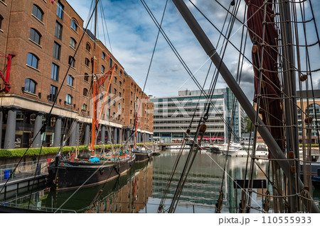 Boats And Ships In St Katharine Docks With Office Buildings And Restaurants In London, United Kingdom 110555933