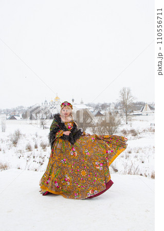 beautiful Russian girl in a winter national dress 110556711