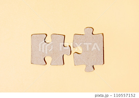 Puzzle pieces on light background. gray square puzzle pieces grid. Business background. close up 110557152