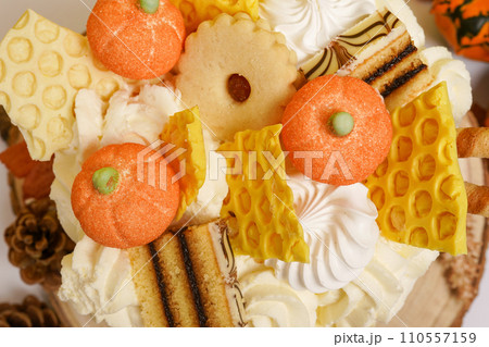 Autumn dessert with pumpkins and cookies, thanksgiving cooking Autumn dessert with pumpkins and cookies, thanksgiving cooking 110557159