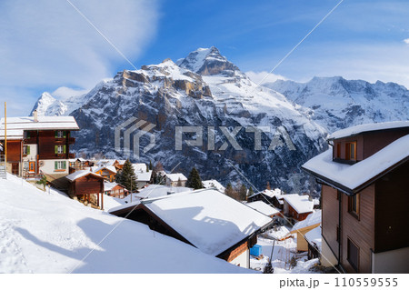 Murren village, Switzerland. Winter mountain landscape. Village among the mountains. Murren village, Switzerland. Winter mountain landscape. Village among the mountains. 110559555
