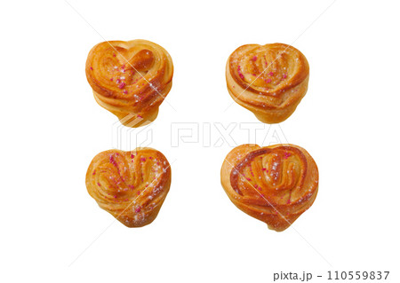 Heart shaped homemade buns isolated on white Heart shaped homemade buns isolated on white 110559837