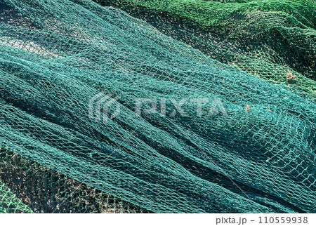Old fishing net close-up. Old fishing net close-up. 110559938
