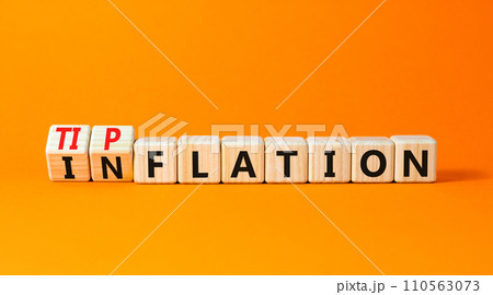 Inflation or tipflation symbol. Concept words Inflation Tipflation on beautiful wooden blocks. Beautiful orange table orange background. Business inflation Tipflation concept. Copy space Inflation or tipflation symbol. Concept words Inflation Tipflation on beautiful wooden blocks. Beautiful orange table orange background. Business inflation Tipflation concept. Copy space 110563073