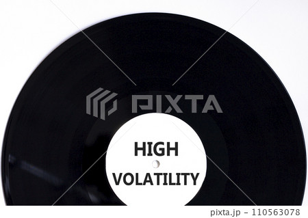 High volatility symbol. Concept words High volatility on beautiful black vinyl disk. Beautiful white table white background. Business high volatility concept. Copy space. High volatility symbol. Concept words High volatility on beautiful black vinyl disk. Beautiful white table white background. Business high volatility concept. Copy space. 110563078