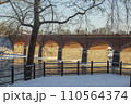Kuldiga in winter. Old brick bridge over Venta rive. Latvia. High quality photo 110564374