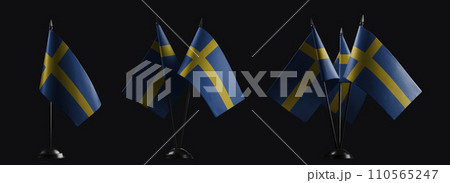 Small national flags of the Sweden on a black background Small national flags of the Sweden on a black background 110565247
