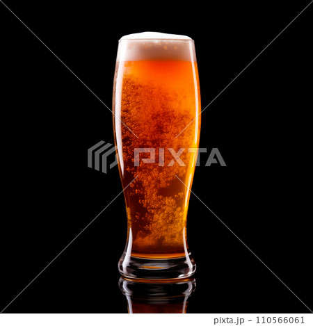 Beer in a tall glass on a dark black background. Mugs with drink like Ipa, Pale Ale, Pilsner, Porter or Stout Beer in a tall glass on a dark black background. Mugs with drink like Ipa, Pale Ale, Pilsner, Porter or Stout 110566061