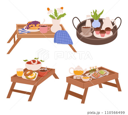 Wooden Trays or Tables With Crisp Cloths, Holds Delightful Breakfast Spread, Fresh Flowers, Warm Pastries, And Coffee Wooden Trays or Tables With Crisp Cloths, Holds Delightful Breakfast Spread, Fresh Flowers, Warm Pastries, And Coffee 110566499