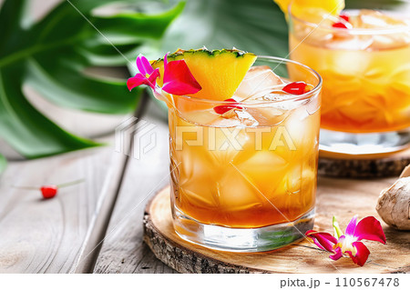 AI-generated content. Mai Tai cocktail served in traditional glass on table with ananas and tropical flowers AI-generated content. Mai Tai cocktail served in traditional glass on table with ananas and tropical flowers 110567478