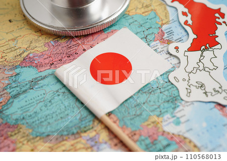 Bangkok, Thailand May 15, 2022 USA Japan flag on world map. 110568013