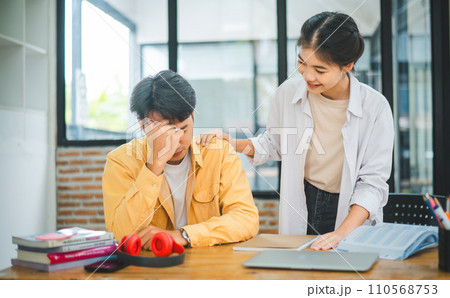 Fellow students are consoling friends who are disappointed in grades, frustrated with tasks that are not meeting their goals, helping each other. Fellow students are consoling friends who are disappointed in grades, frustrated with tasks that are not meeting their goals, helping each other. 110568753