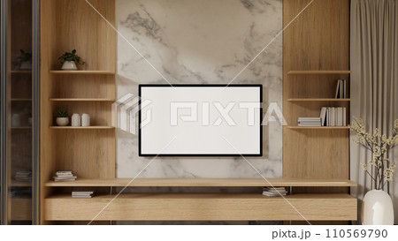 A white TV monitor mockup attached to a marble wall in a modern, expensive living room. 110569790