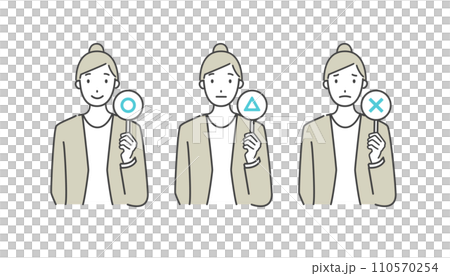 A woman working in an office holding a ○× plate 110570254