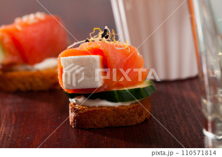 Canape with salted salmon 110571814