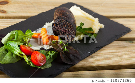 Blood sausage with vegetables 110571869