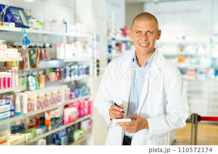 Male pharmacist in drugstore Male pharmacist in drugstore 110572174