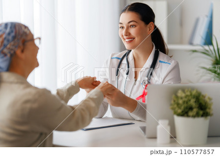 Female patient listening to doctor 110577857