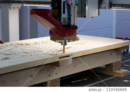 wooden door manufacturing with CNC router machine 110580608