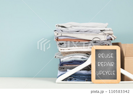 Black letter box with eco friendly motivational quote on blue background. Black letter box with eco friendly motivational quote on blue background. 110583342