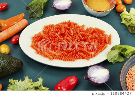 Uncooked fusilli pasta. Uncooked fusilli pasta. 110584427