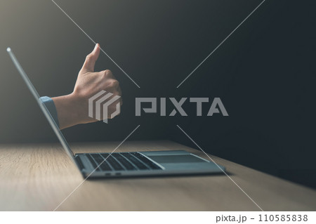 business goal achievement and good job concept.laptop with businessman hand thumbs up. business goal achievement and good job concept.laptop with businessman hand thumbs up. 110585838