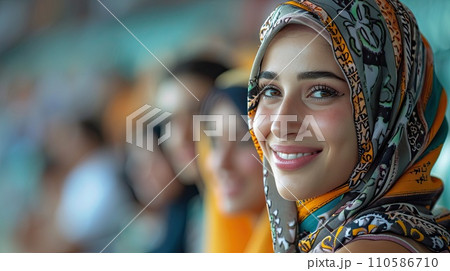 AI-generated content. Beautiful, young, calm Arabian woman in headscarf, with calm positive emotions sitting on crowdy tribune. AI-generated content. Beautiful, young, calm Arabian woman in headscarf, with calm positive emotions sitting on crowdy tribune. 110586710