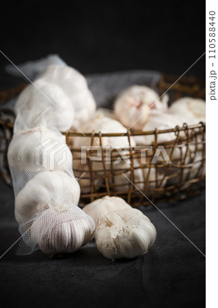 fresh garlic on a wooden table fresh garlic on a wooden table 110588440