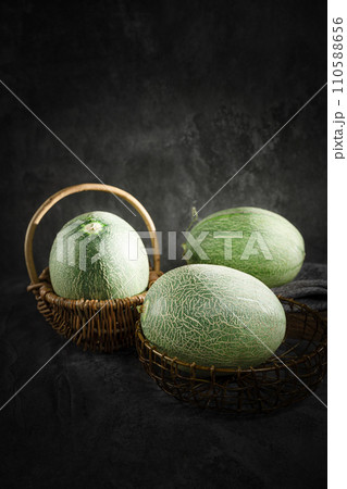 fresh melon on black background 110588656