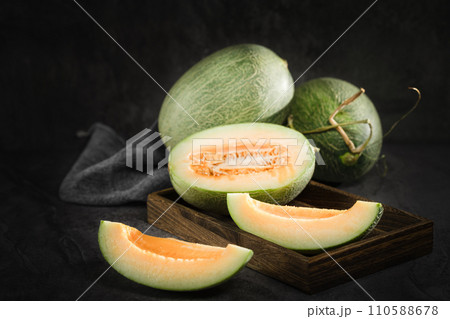 fresh melon on black background 110588678