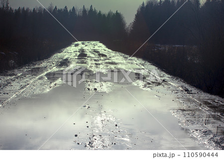 Winter dirt way glitters in ambient light Winter dirt way glitters in ambient light 110590444